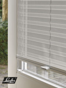 Elegant inward-opening tilt and turn window showcasing professional TruFit blind installation