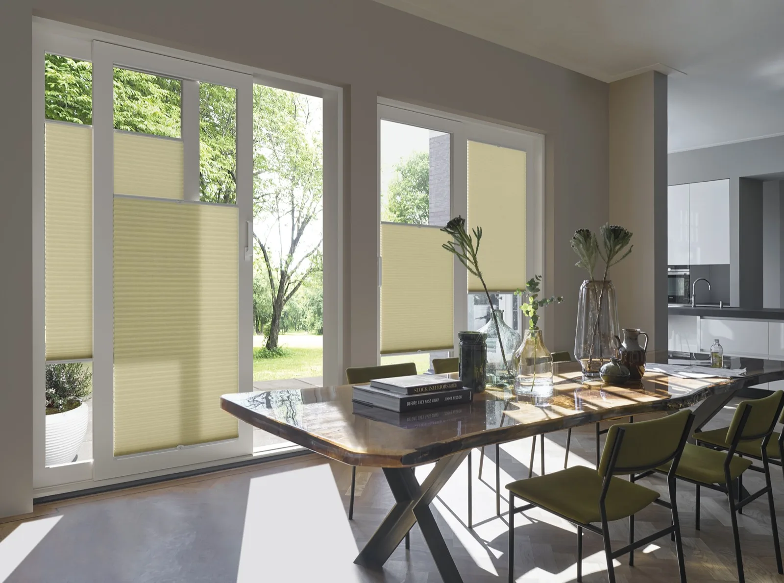 Luxaflex Duette shades on bifold doors in a contemporary dining room