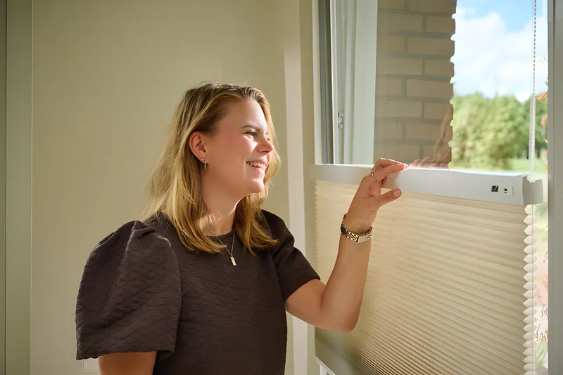 Luxaflex DuoMotion blind on a tilt-and-turn window