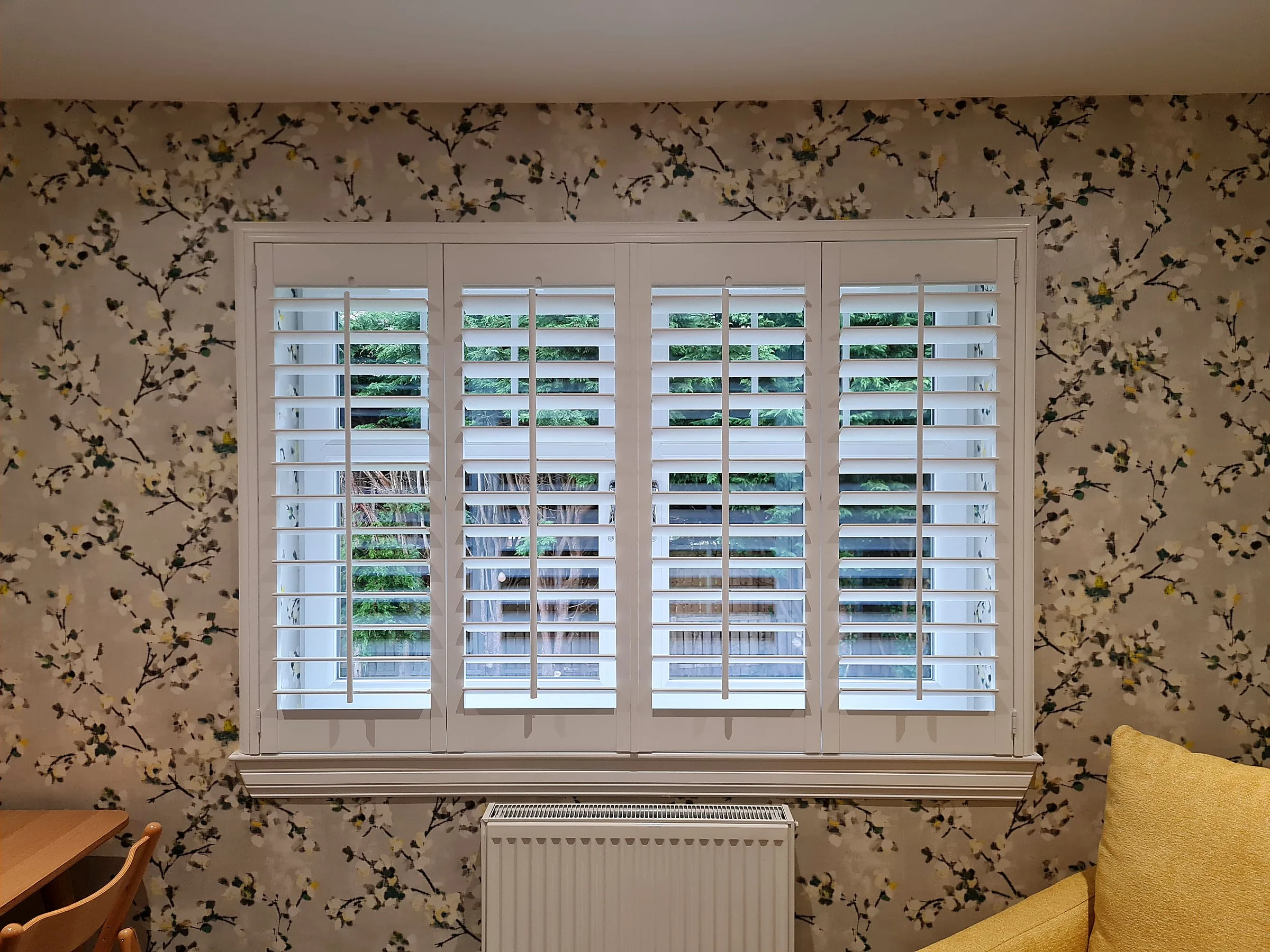 Full height shutters in a living room
