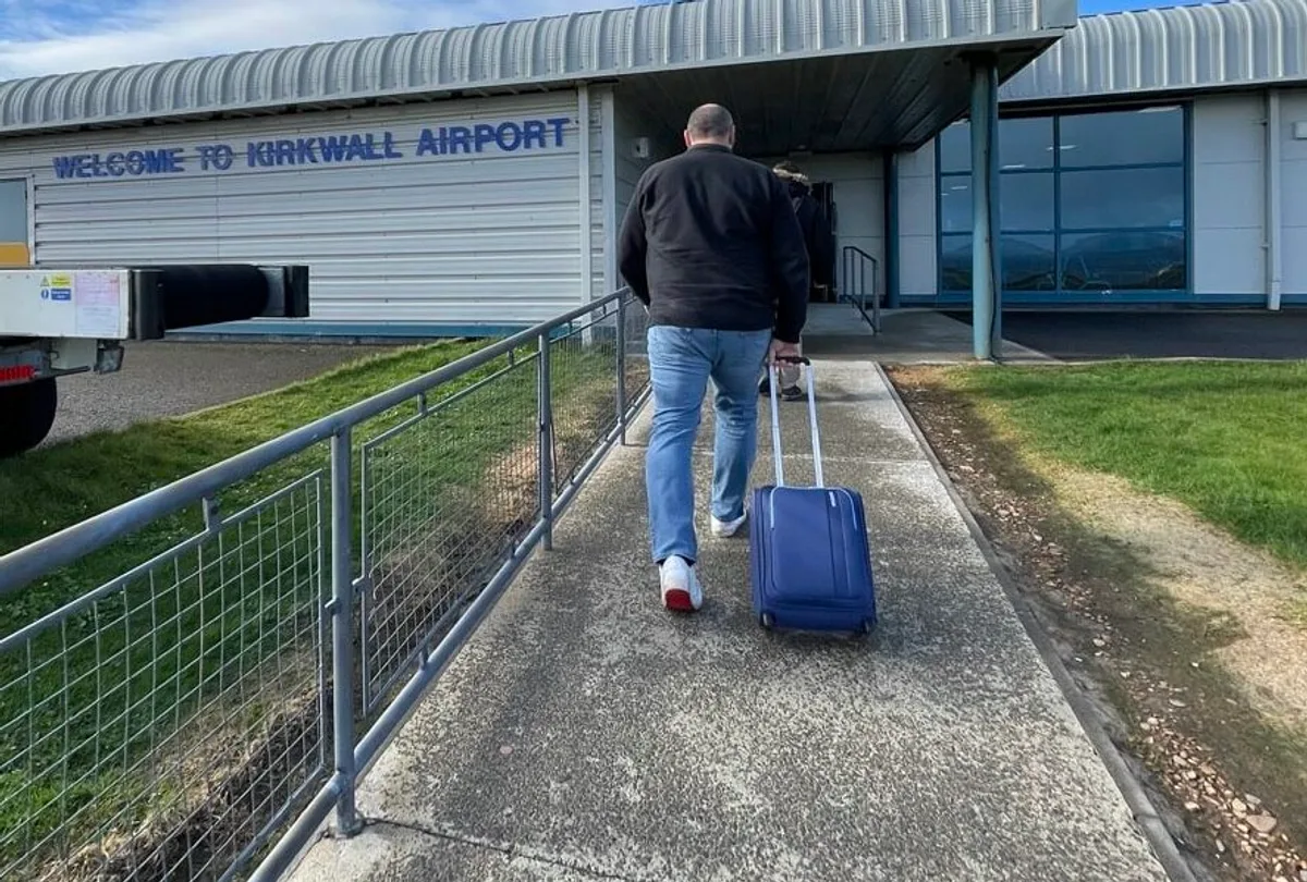 David from The Scottish Shutter Company arriving at Kirkwall Airport on Orkney
