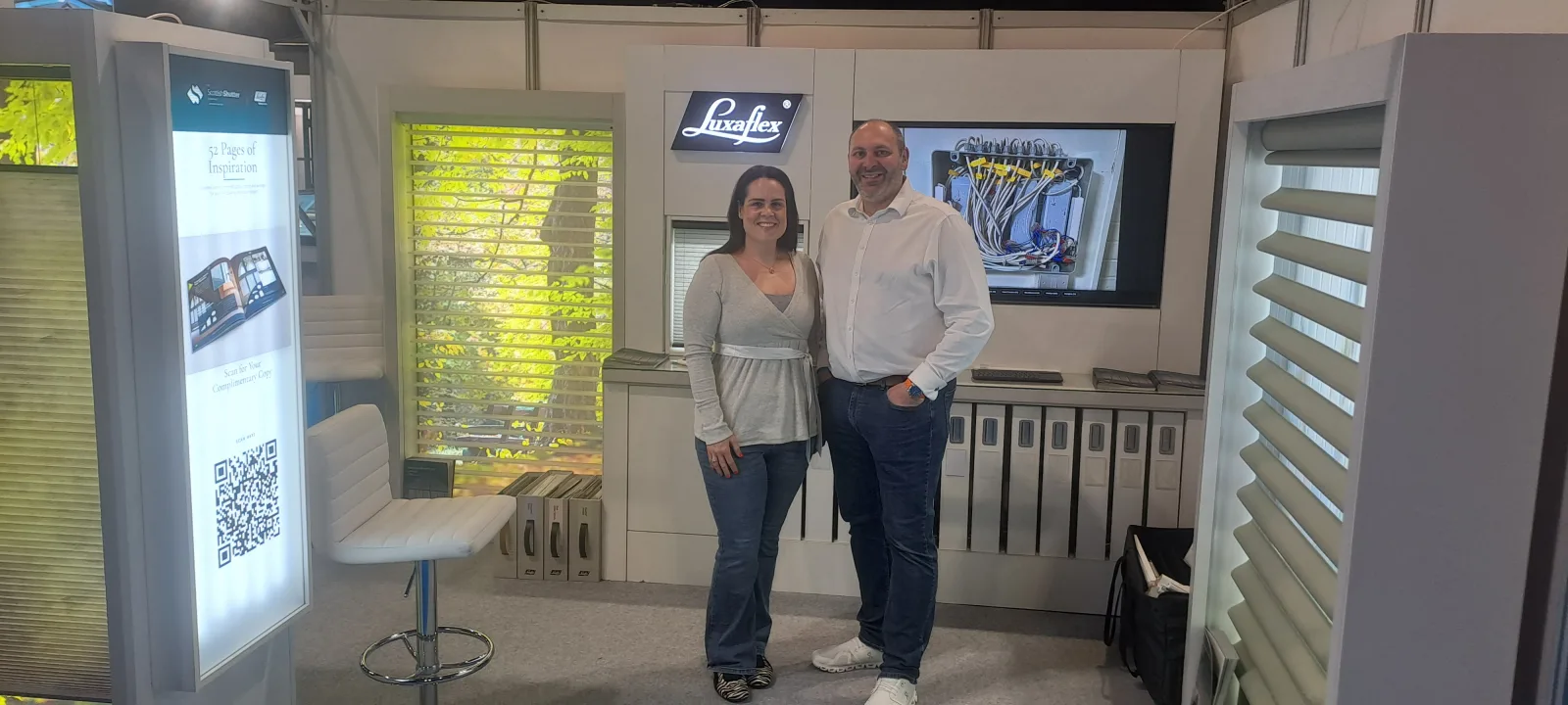 Judith D'Ambrosio and David D'Ambrosio on the joint Scottish Shutter Company and Luxaflex stand at the Homebuilding and Renovating Show at SEC Glasgow