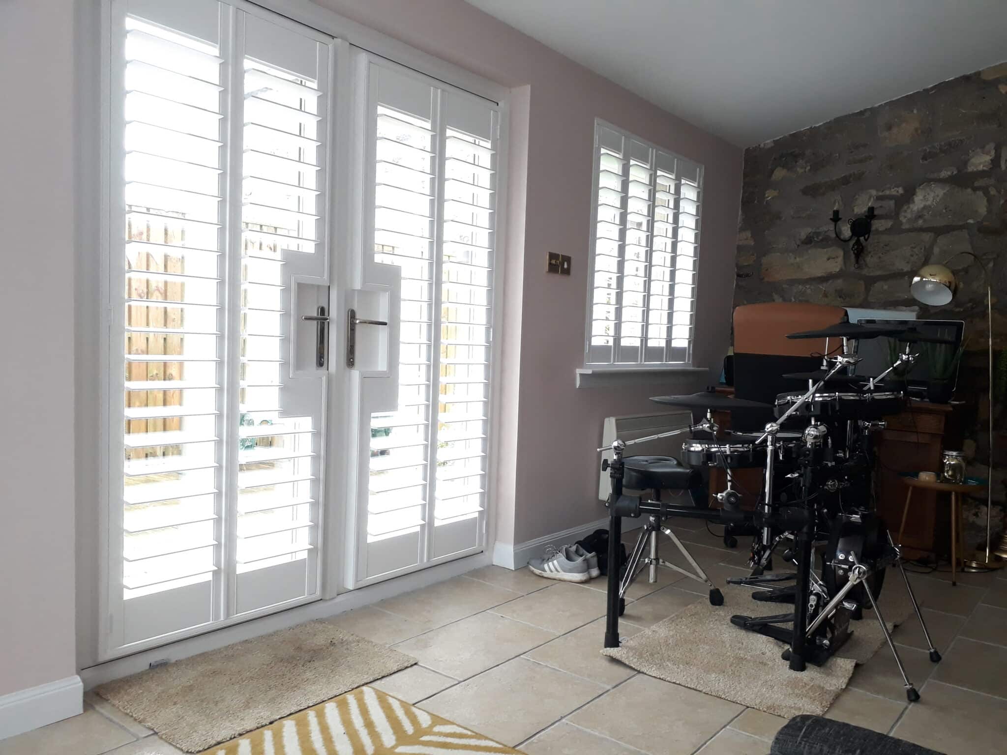 Sliding Patio Doors: Shutters vs. Blinds
