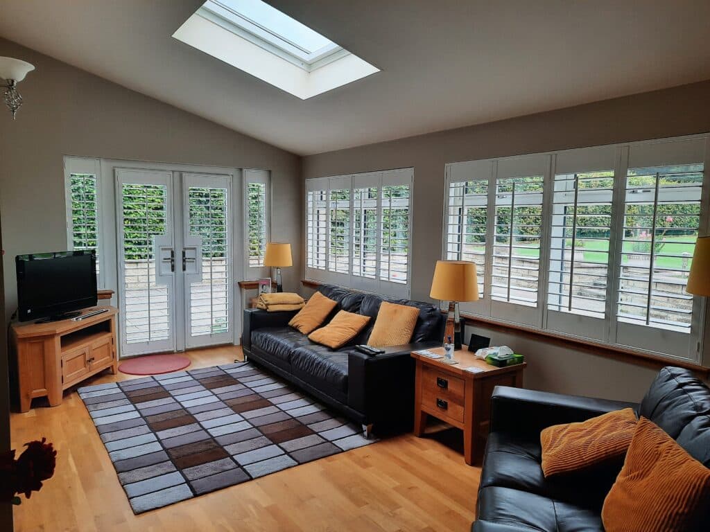 Window Shutters with a French Door Cutout for the Door Handle