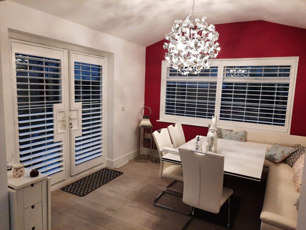 Window Shutters with a French Door Cutout for the Door Handle