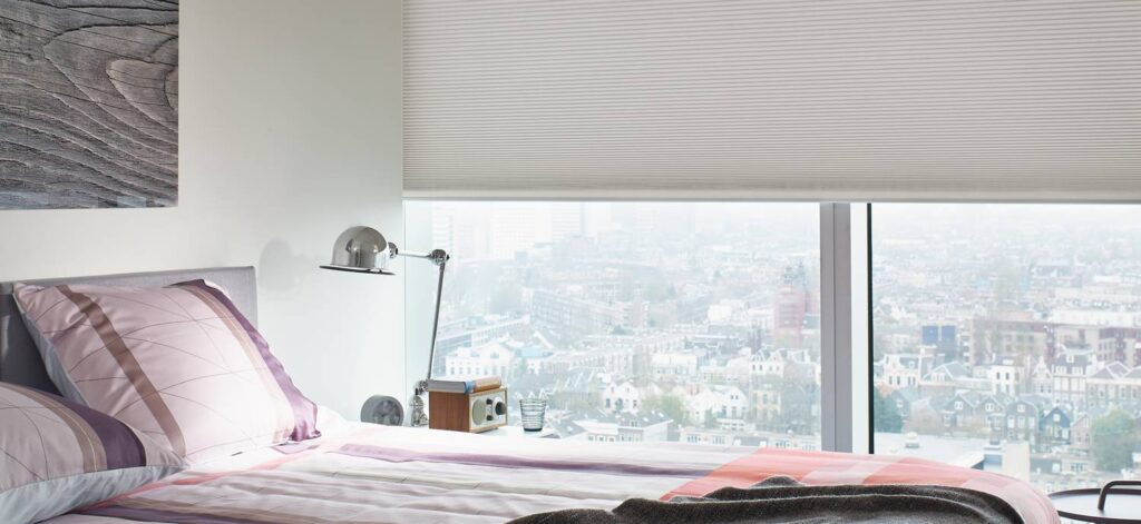 Luxaflex Duette dim-out blind in a bedroom - The Scottish Shutter Company