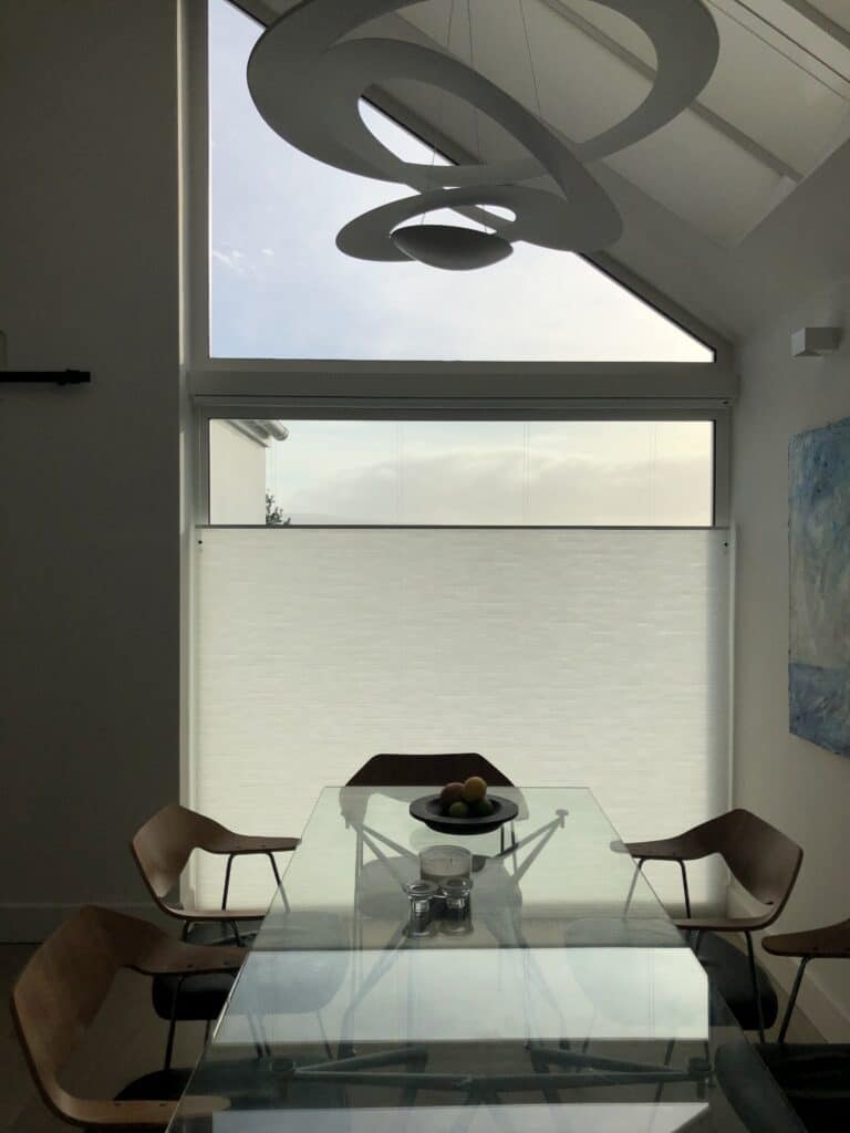 Top-Down, Bottom-Up Duette Blinds in a Dining Room on the Island of Mull by The Scottish Shutter Company