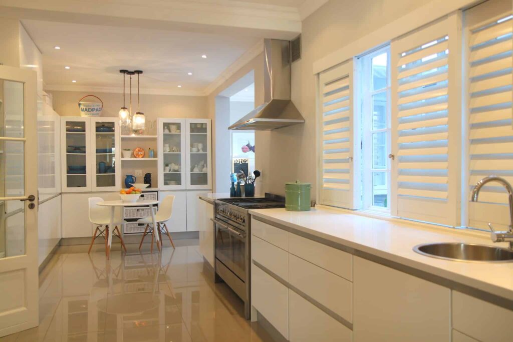 ByPass Aluminium Security Shutters  with 89mm louvres and finished in Satin White