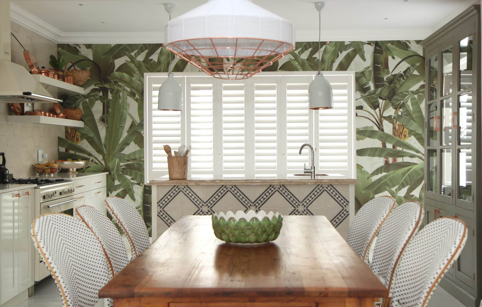 Satin White Six Panel, Tracked Security Shutters in a Kitchen