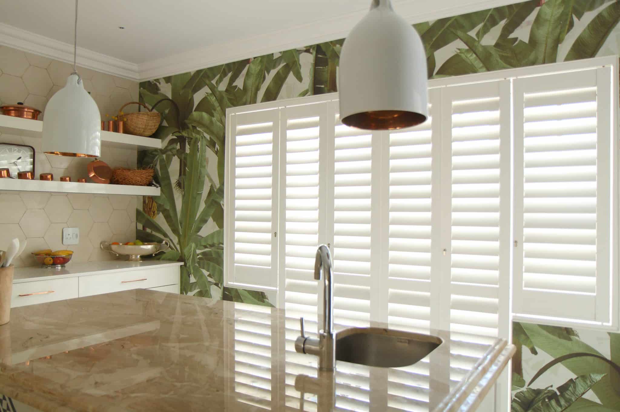 Satin White Six Panel, Tracked Security Shutters in a Kitchen