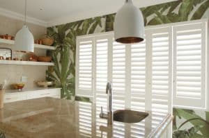 Portchester Security Shutters in a Kitchen - Satin White from The Scottish Shutter Company