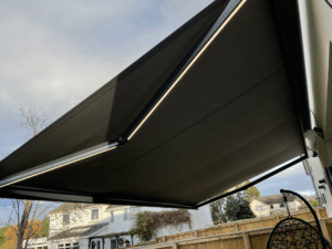 LED Arm Lights on a Garden Awning from The Scottish Shutter Company